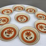 Set 11 plates 1970 Revernay Sarreguemines orange and brown on sandstone background