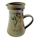 Savoyard glazed terracotta pitcher with leaf decoration - 661005