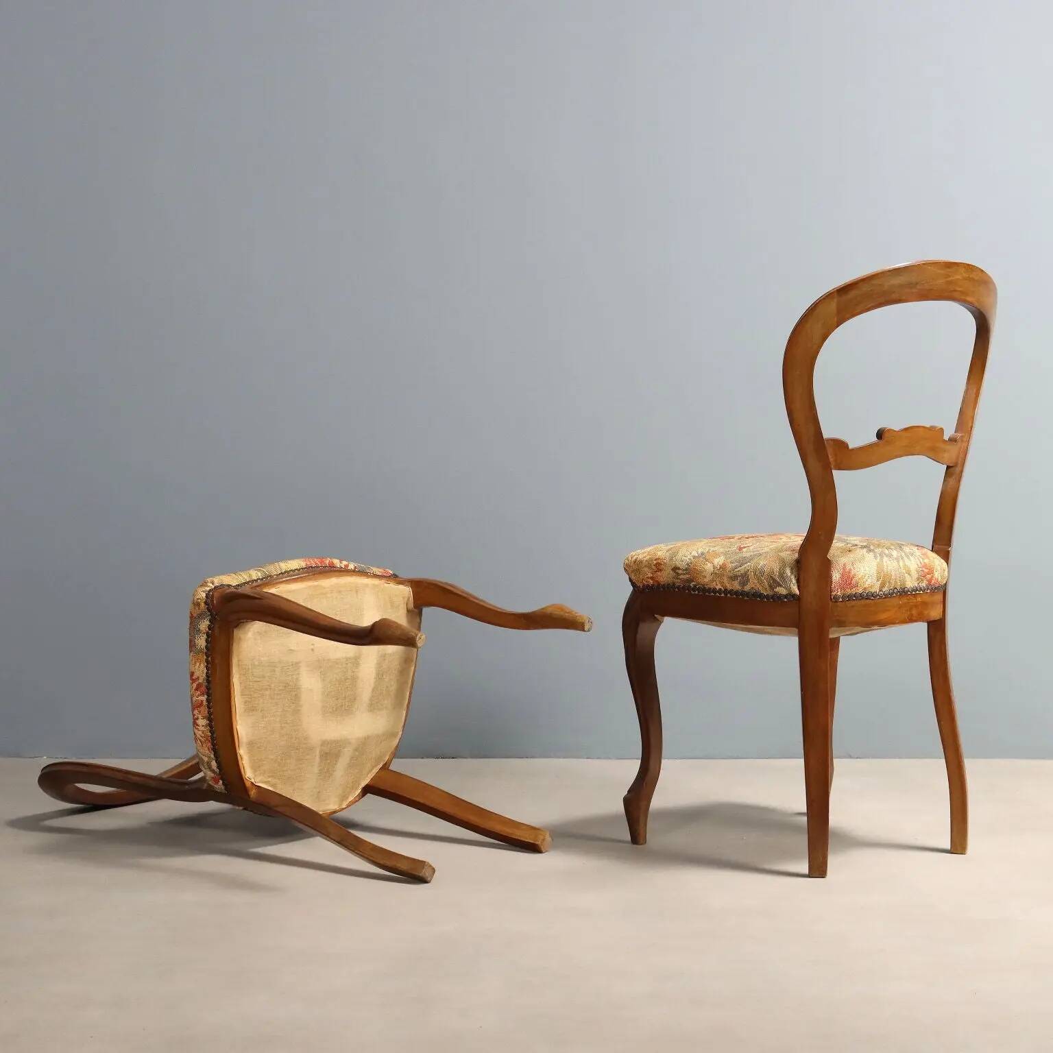 Pair of antique Louis-Philippe chairs in walnut and fabric, Italy, 19th century.
