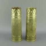 Pair of shell casings forming repulsed copper vases