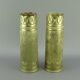 Pair of shell casings forming repulsed copper vases