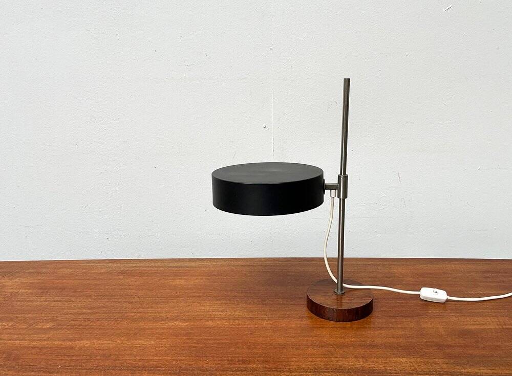 Mid-century minimalist table lamp with a teak veneer base, 1960s.