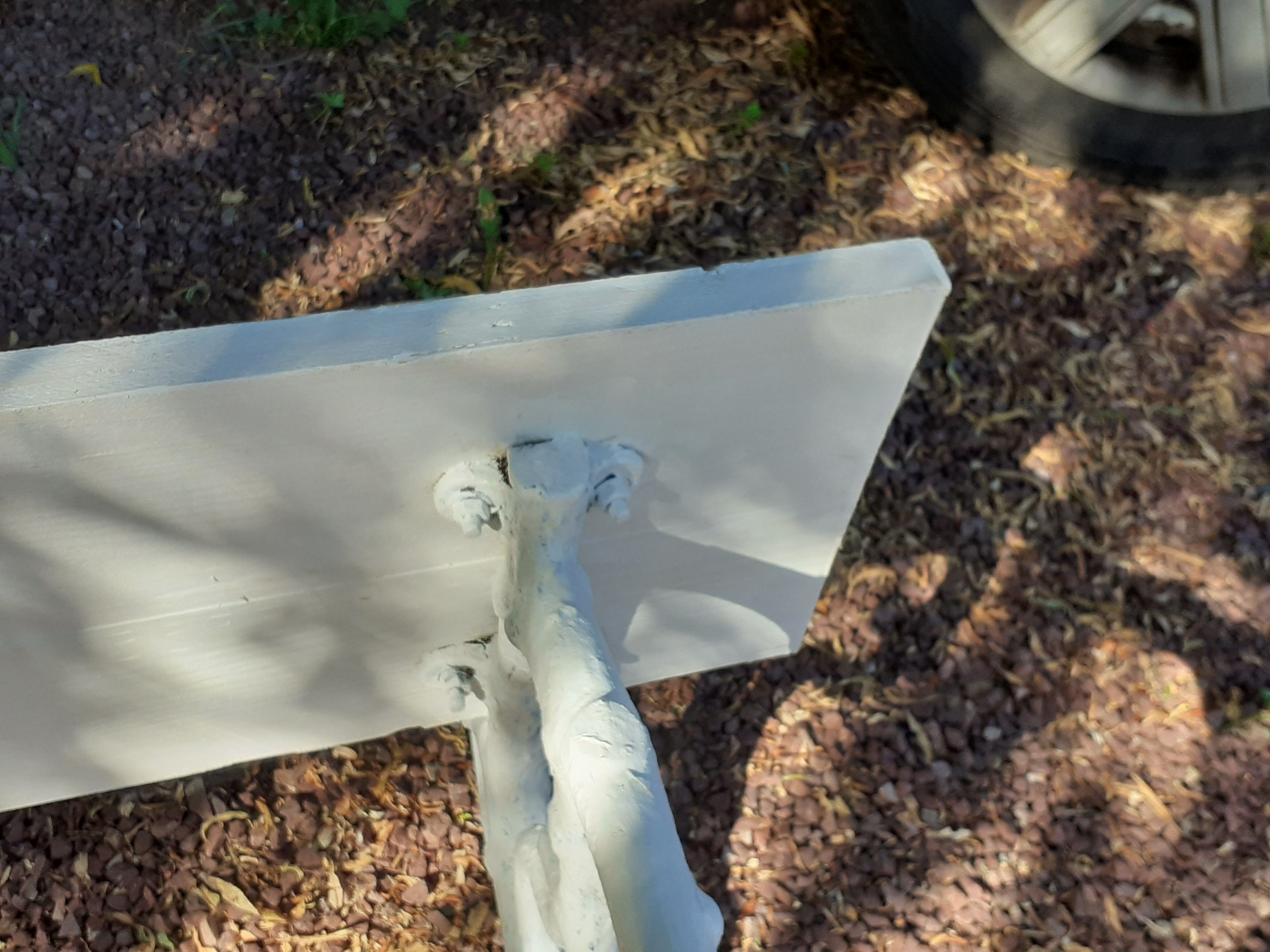 Old garden bench with cast iron feet and wooden planks