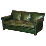 Victorian leather canapé, shield armrests, stamped Maple & Co.