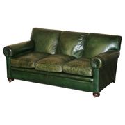 Victorian leather canapé, shield armrests, stamped Maple & Co.