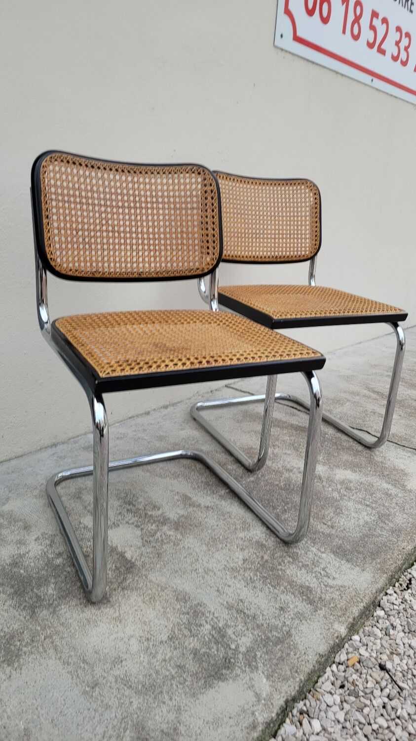 Pair of chairs by Marcel Breuer in black canework model B32 signed Italy