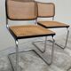 Pair of chairs by Marcel Breuer in black canework model B32 signed Italy