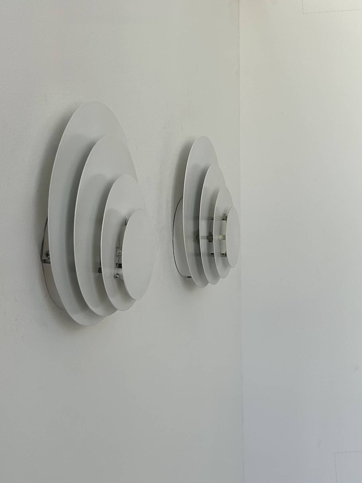 Pair of vintage wall lights, matte white metal, France, 1980.