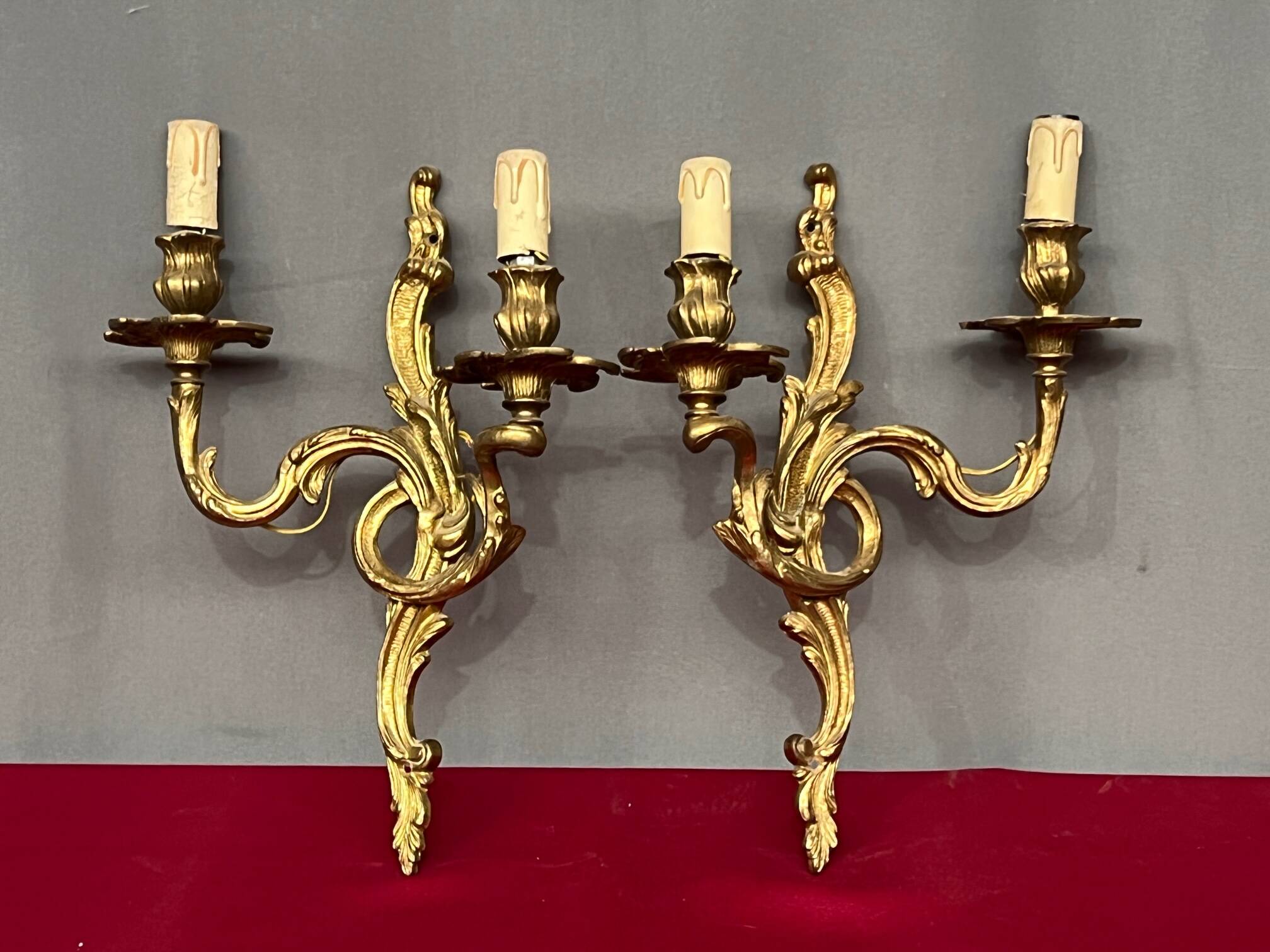 Pair of Rococo gilded solid bronze wall lights.