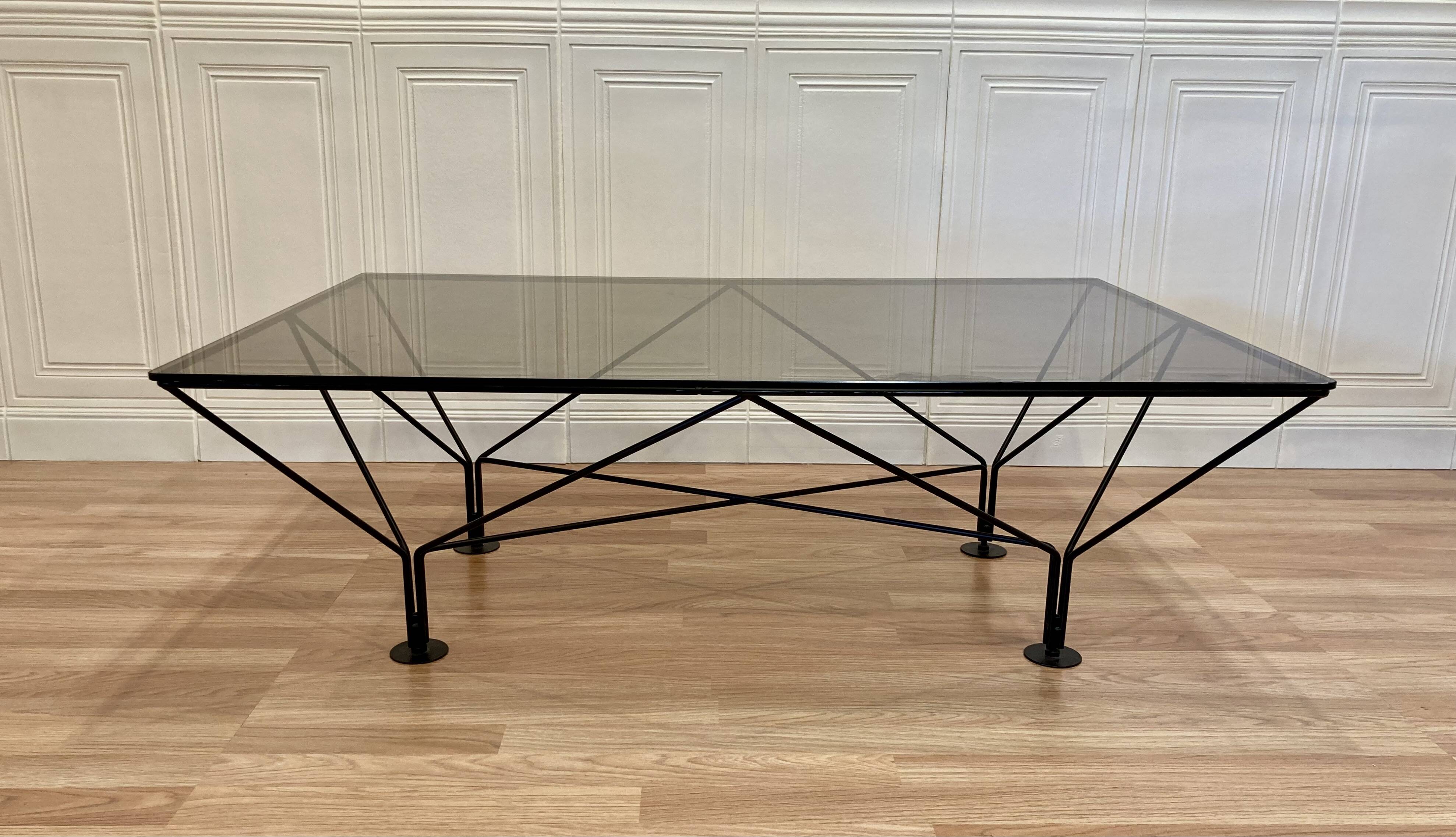 Designer glass and metal coffee table.