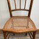 Set of 2 antique wooden bistro chairs canned seats