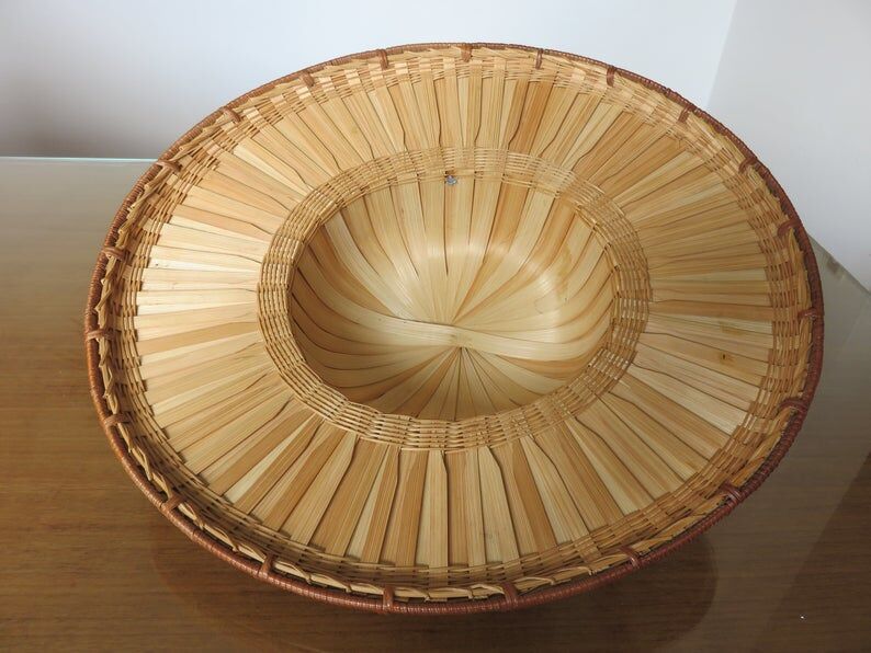 Colonial hat in bamboo and braided rattan, wall decoration