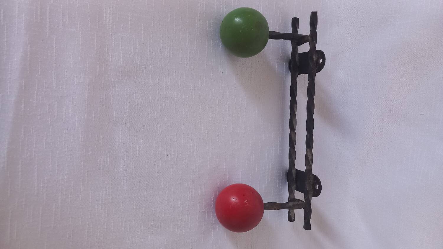 Vintage ball and metal coat racks