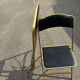 Two chairs, similar black