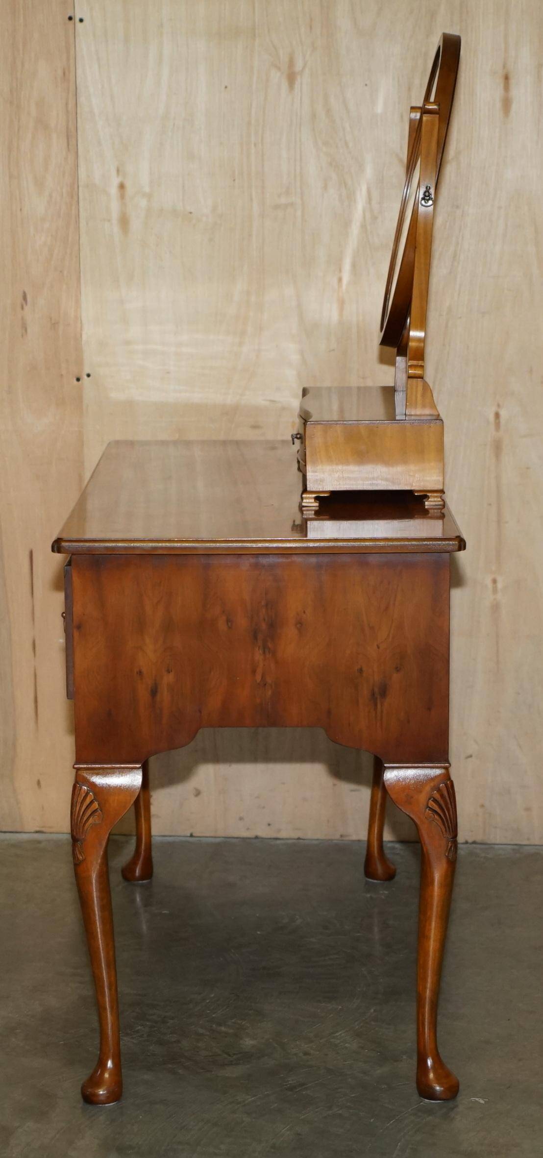 Vintage English walnut burr dressing table with mirror and chair.