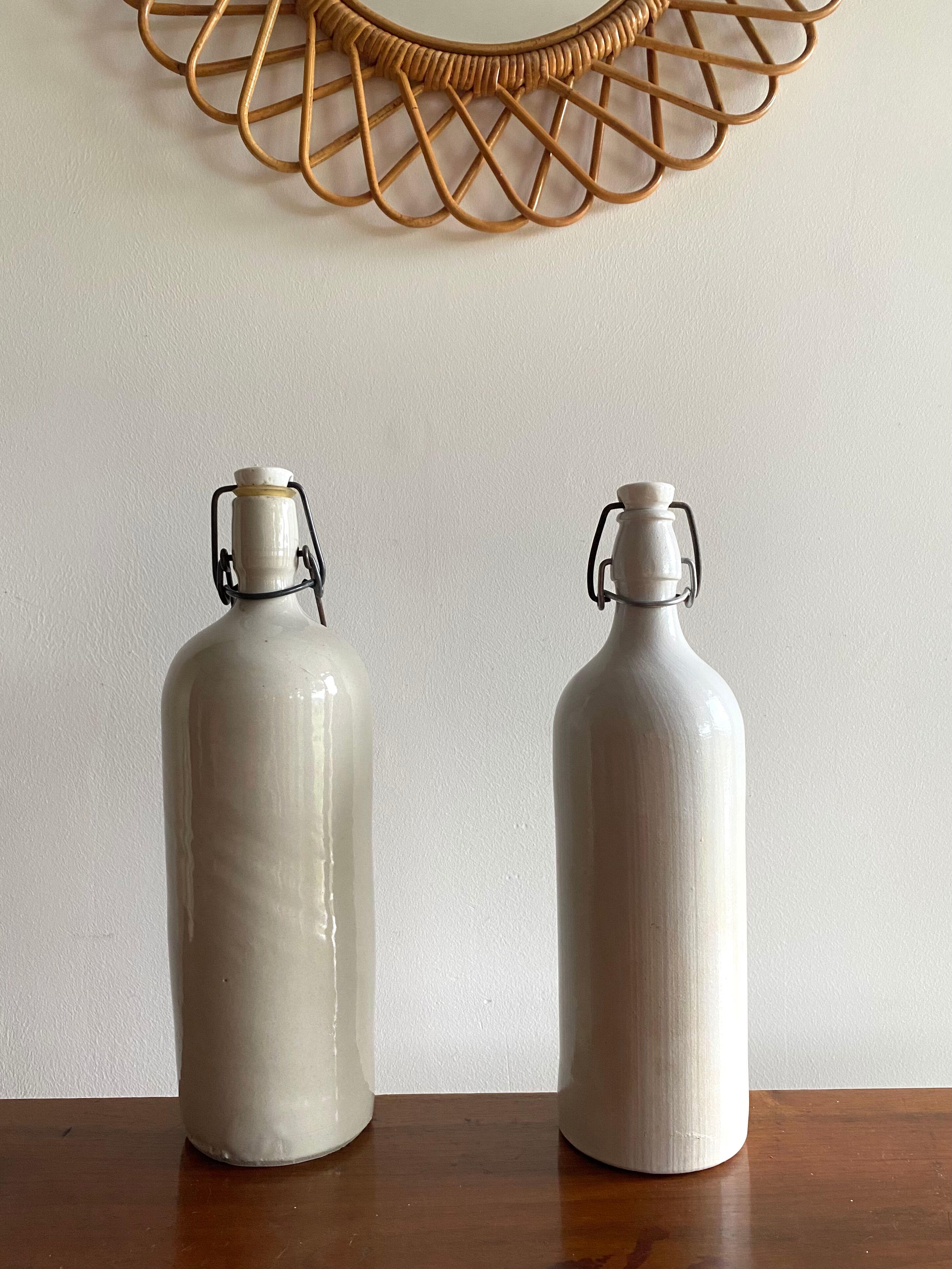 Set of 2 old bottles in glazed stoneware