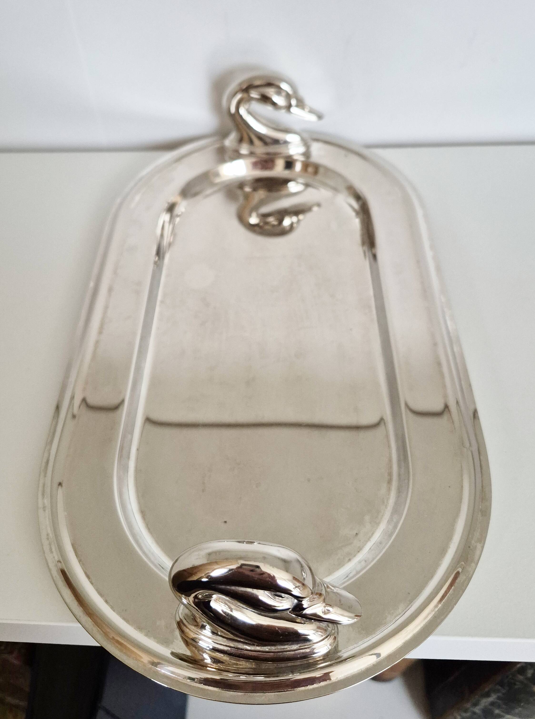 Silver-plated serving dish for foie gras.
