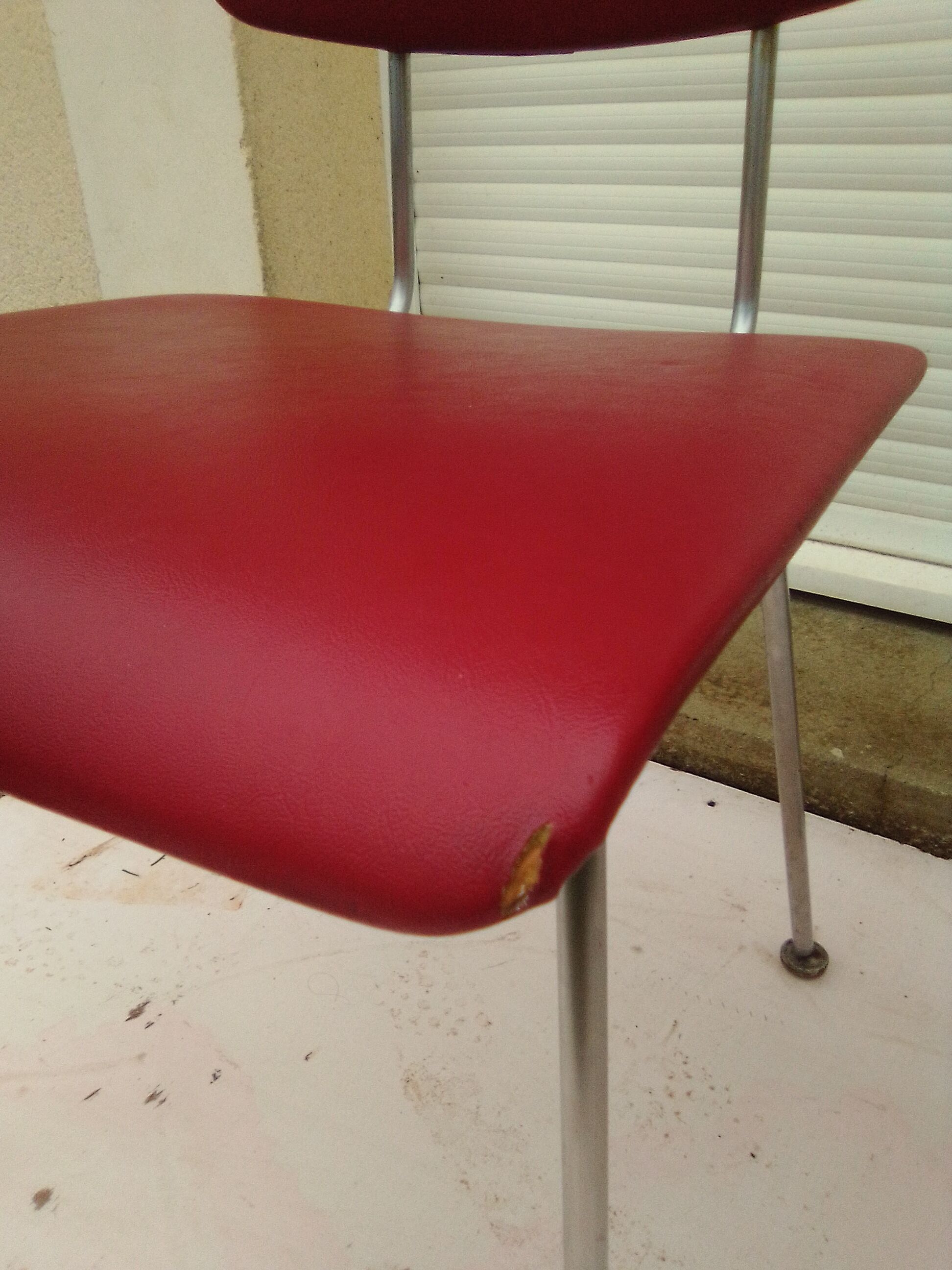 2 chairs in red skaï metal struxture 70s