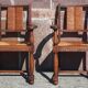 Pair of oak armchairs with straw seats and backs.