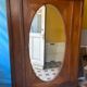 Oval mirror wardrobe