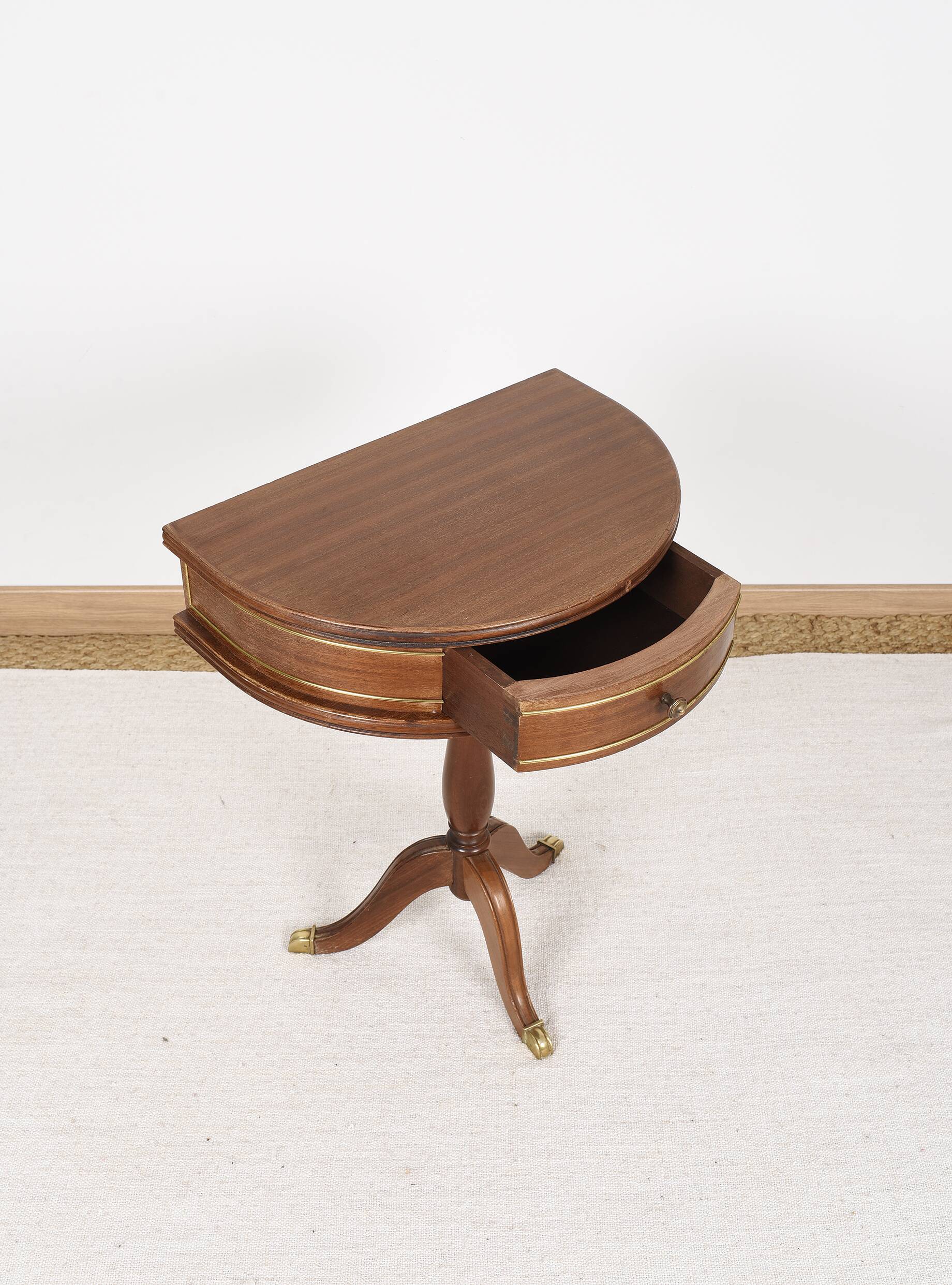 Pedestal table or small side table with drawer.