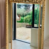Large mirror style Louis XVI in gilded wood with parecloses xixth h: 165 cm