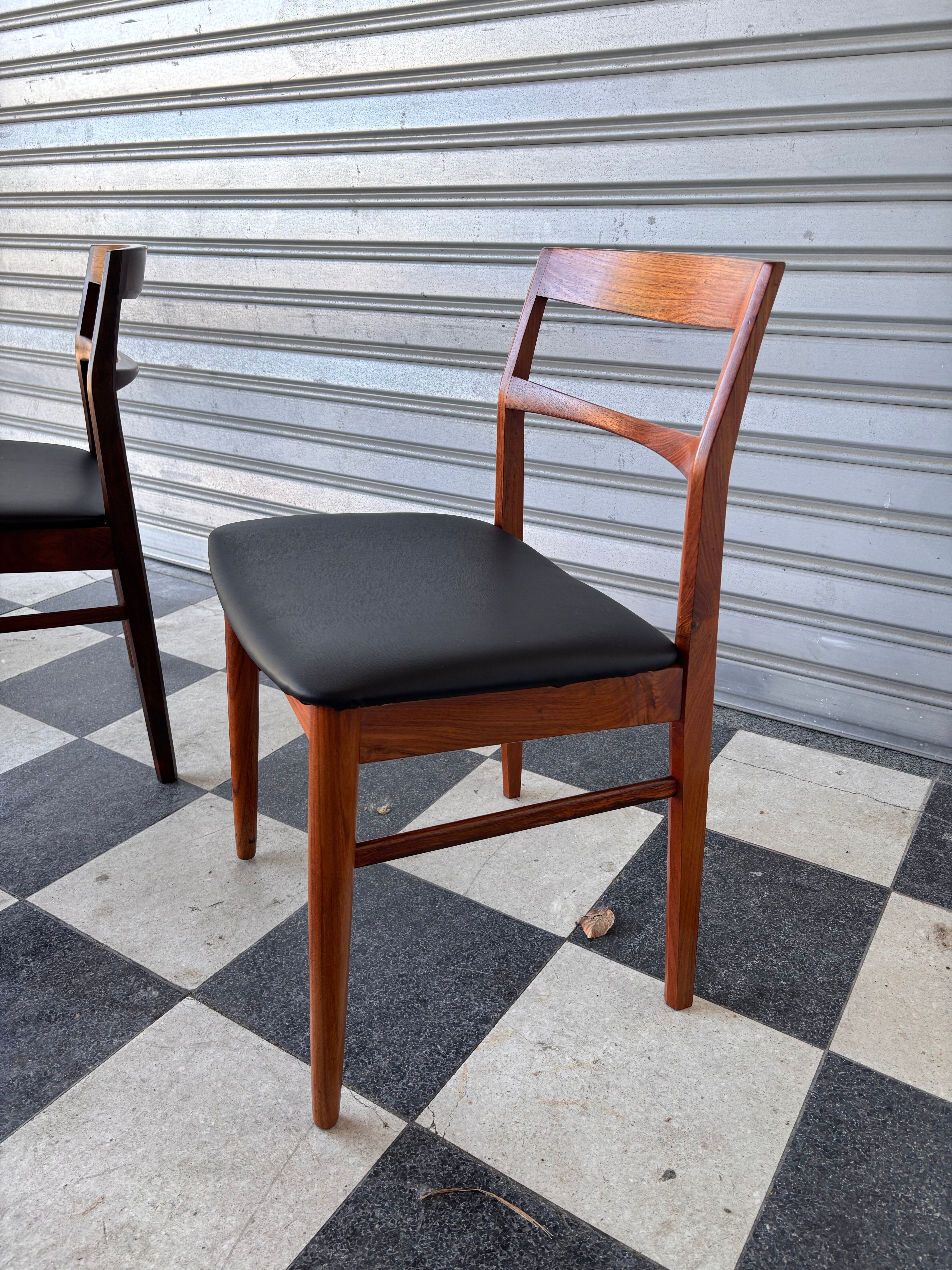 Set of 6 Henning Kjaernulf chairs in rosewood.
