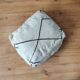 Berber Moroccan pouf in black and white.