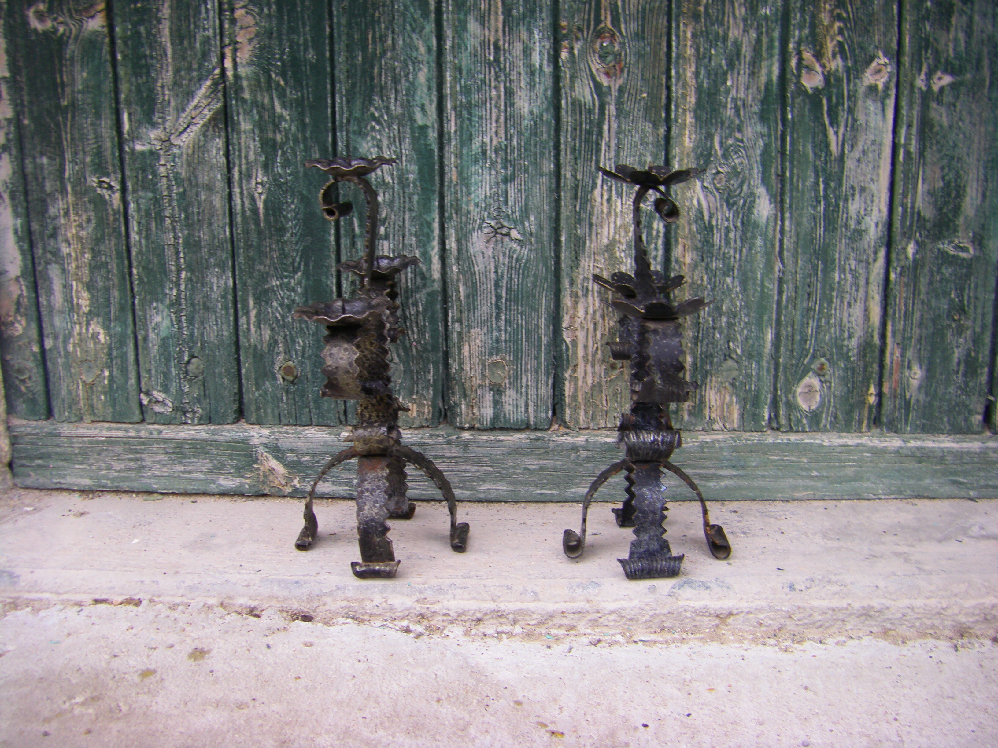 Two wrought iron chandeliers