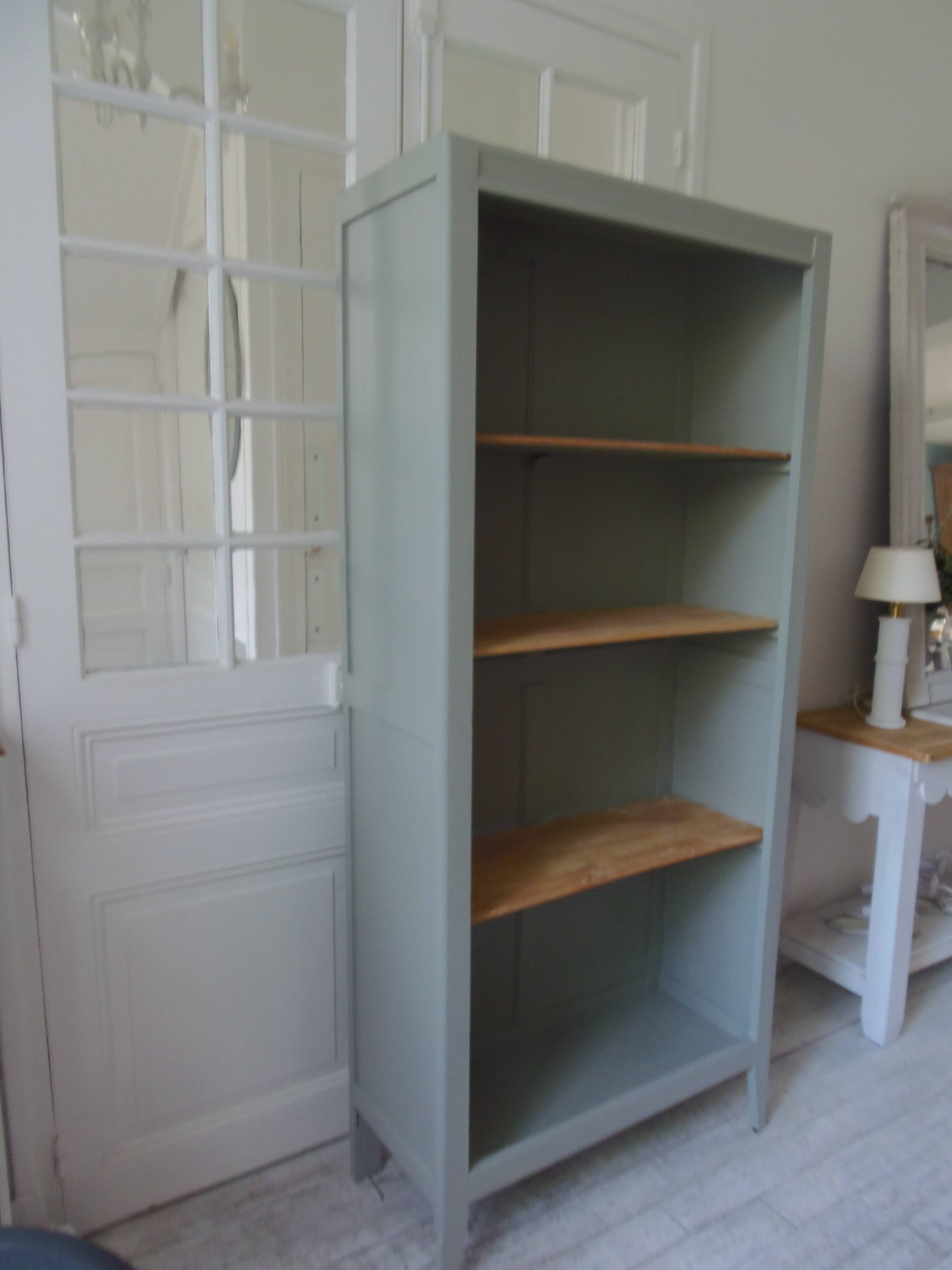 Vintage shallow bookcase re-enchanted in verdigris.