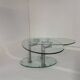 Oval designer coffee table in tempered glass