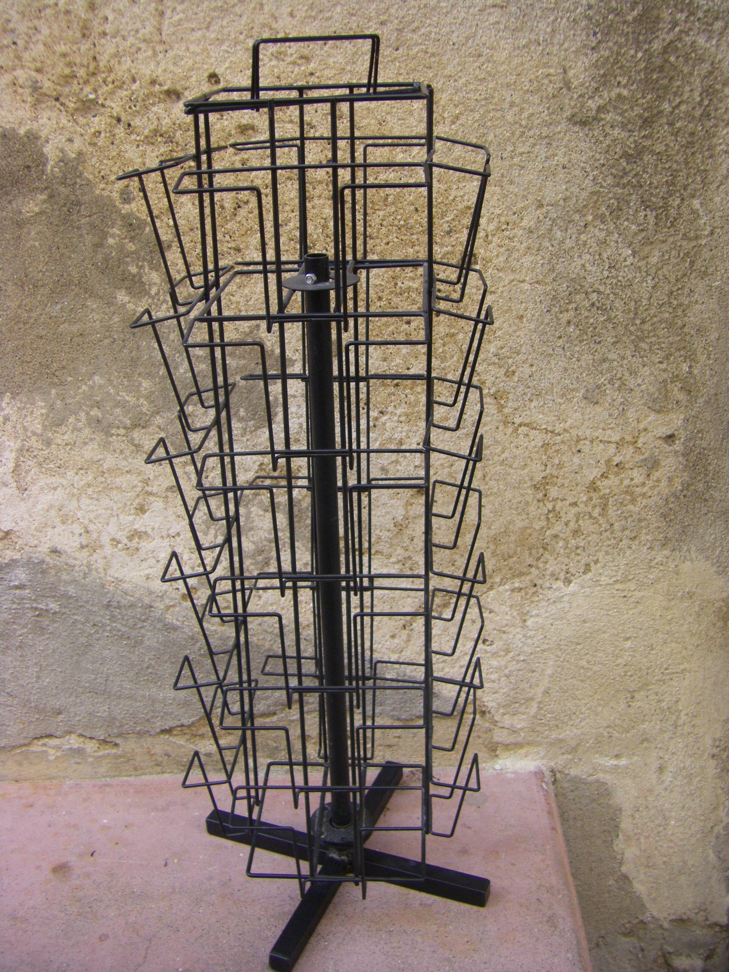 Black metal postcard turnstile display