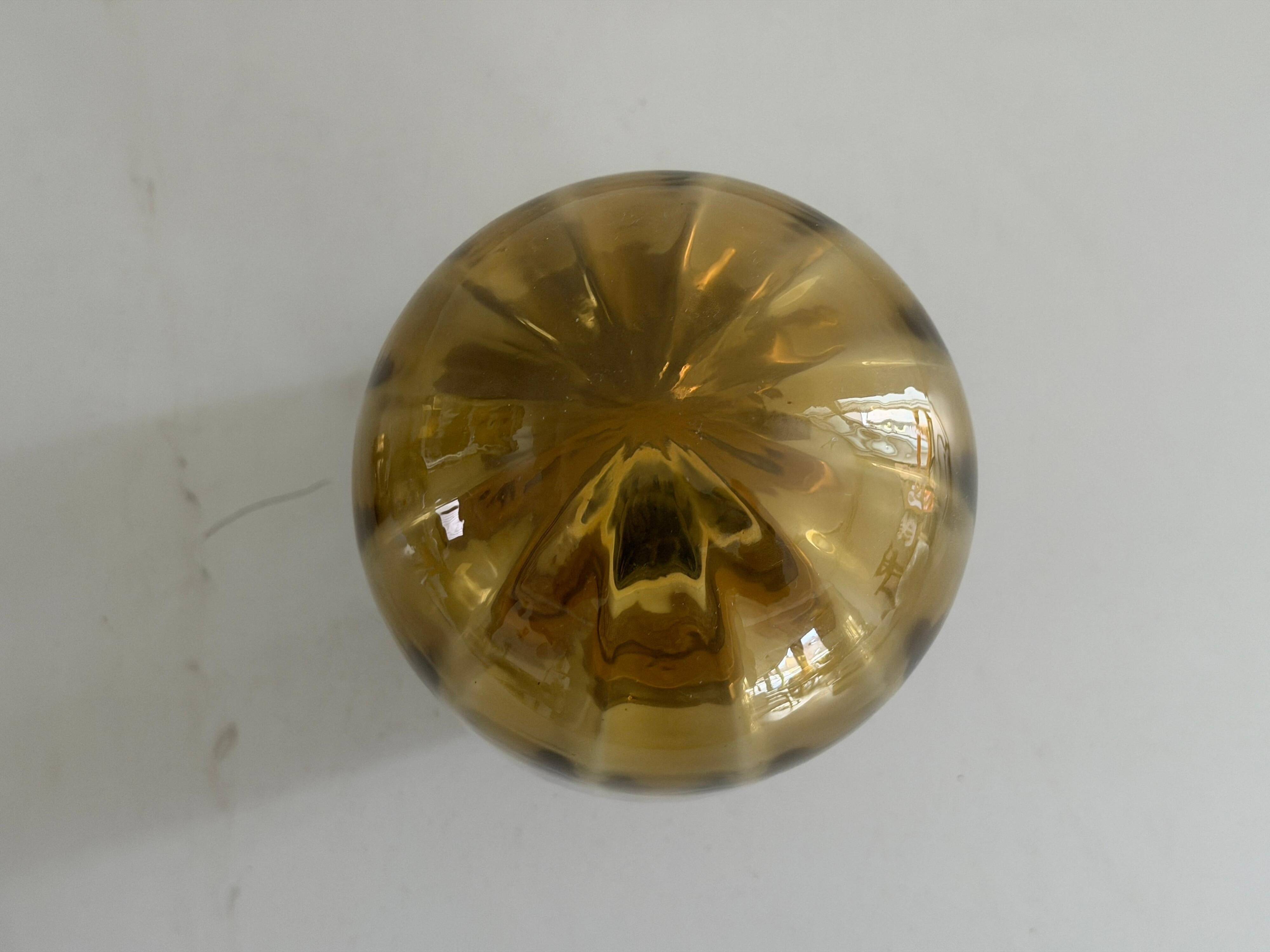 Pair of yellow glass and brass wall lights from the mid-century by N Leuchten, 1960s, Germany.