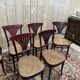 Suite de 4 chaises et deux fauteuils cannés thonet à "palmettes"