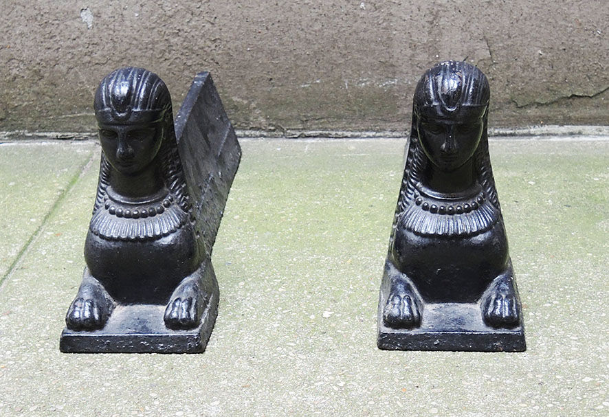 Old cast iron sphinx chenets