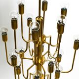 Three staged 18 arm Mid Century brass chandelier with a long brass rod