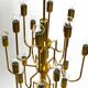 Three staged 18 arm Mid Century brass chandelier with a long brass rod
