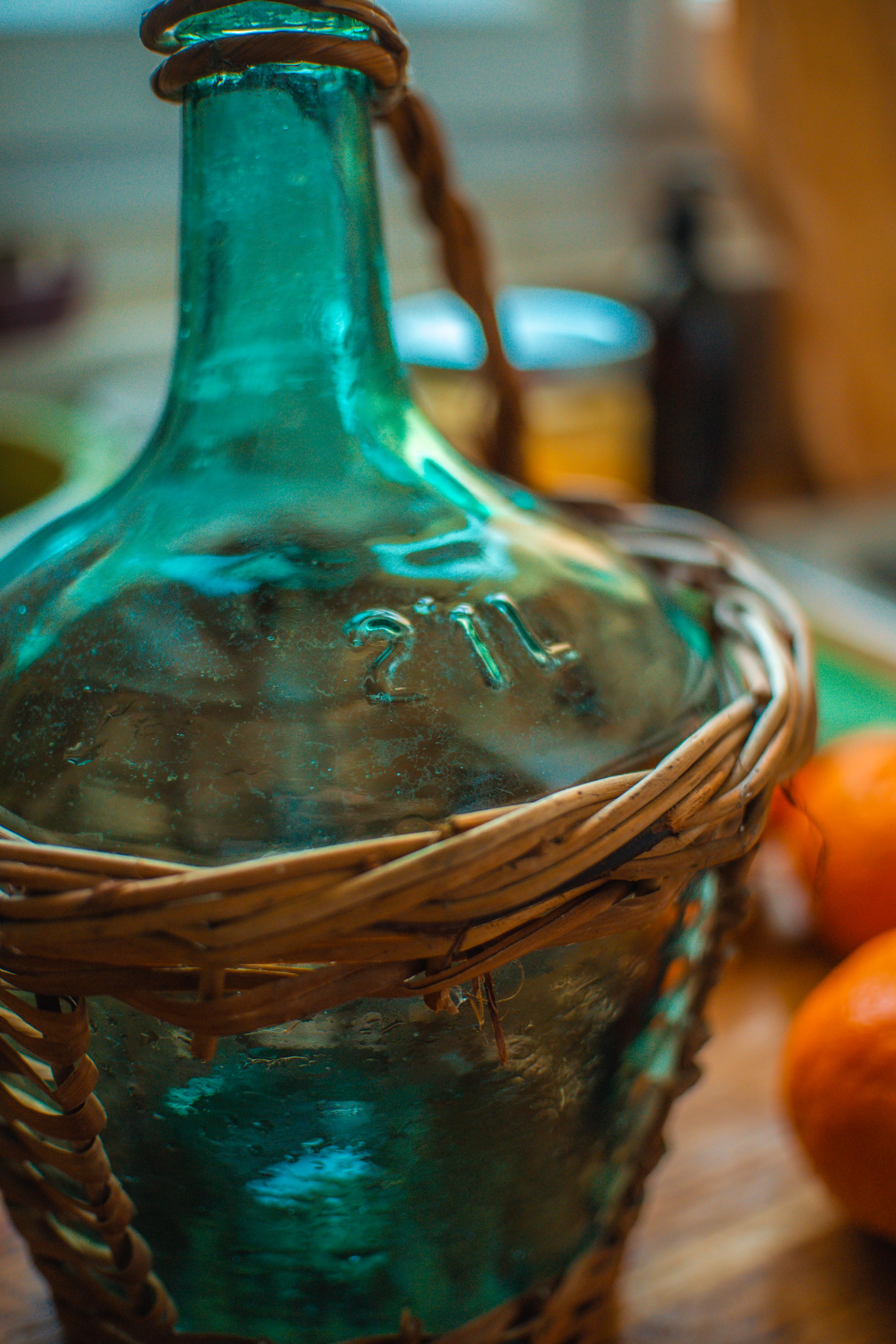 Dame Jeanne with her wicker case