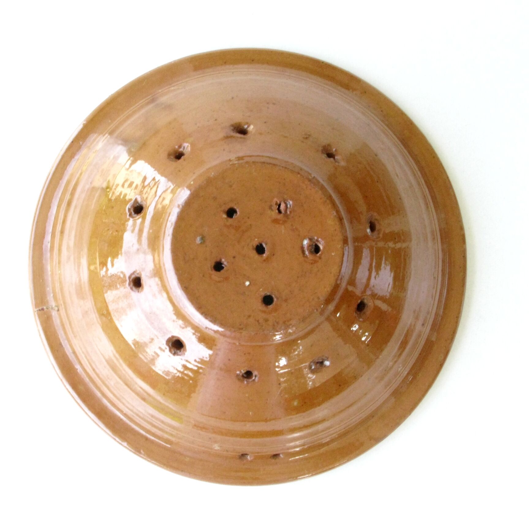 Old drainer dish faisselle in earthenware Varnishing brown