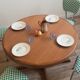 Baumann extendable round table