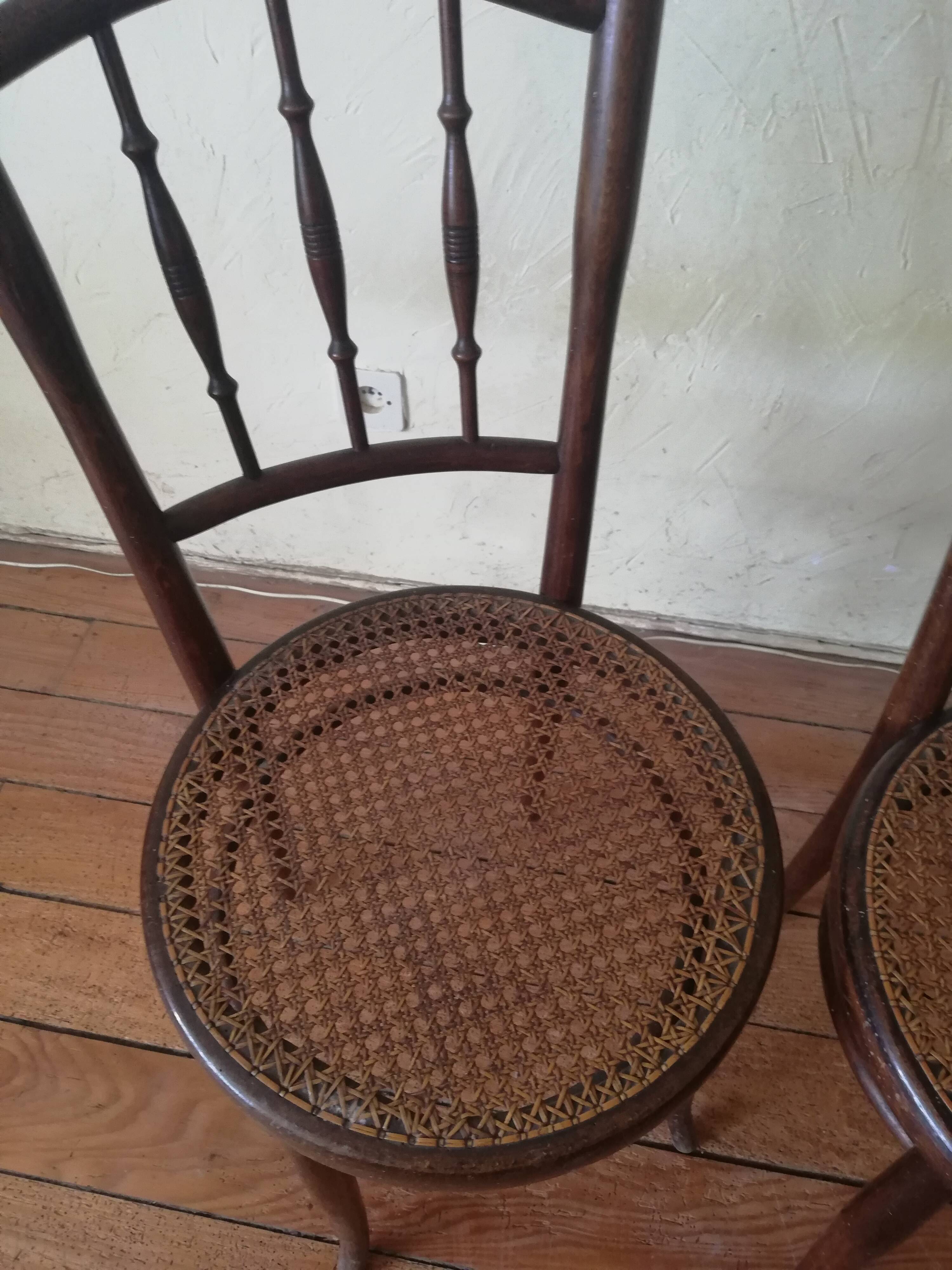Old curved wooden bistro chairs