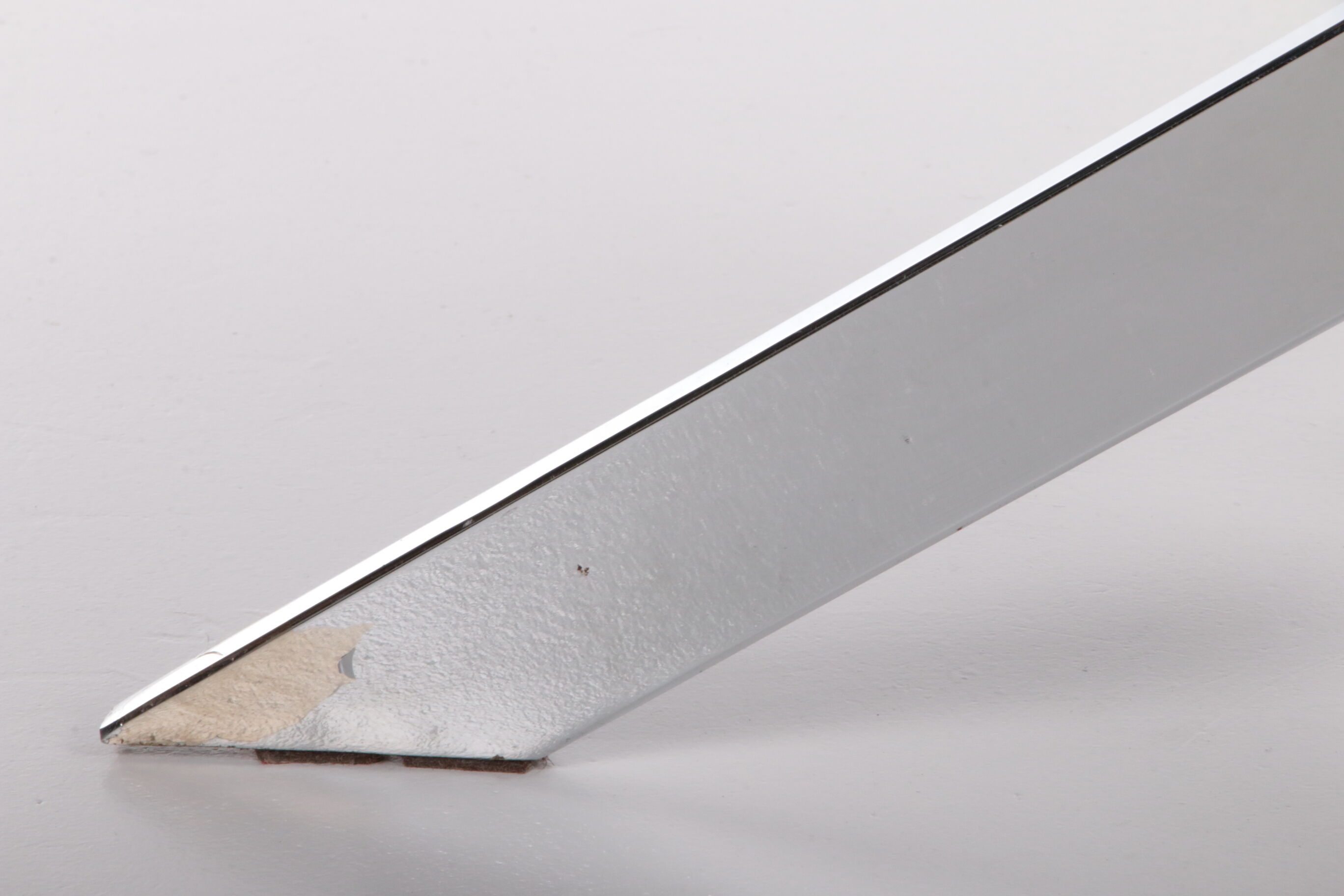 Vintage chrome coffee table with X frame and round glass top, 1980s