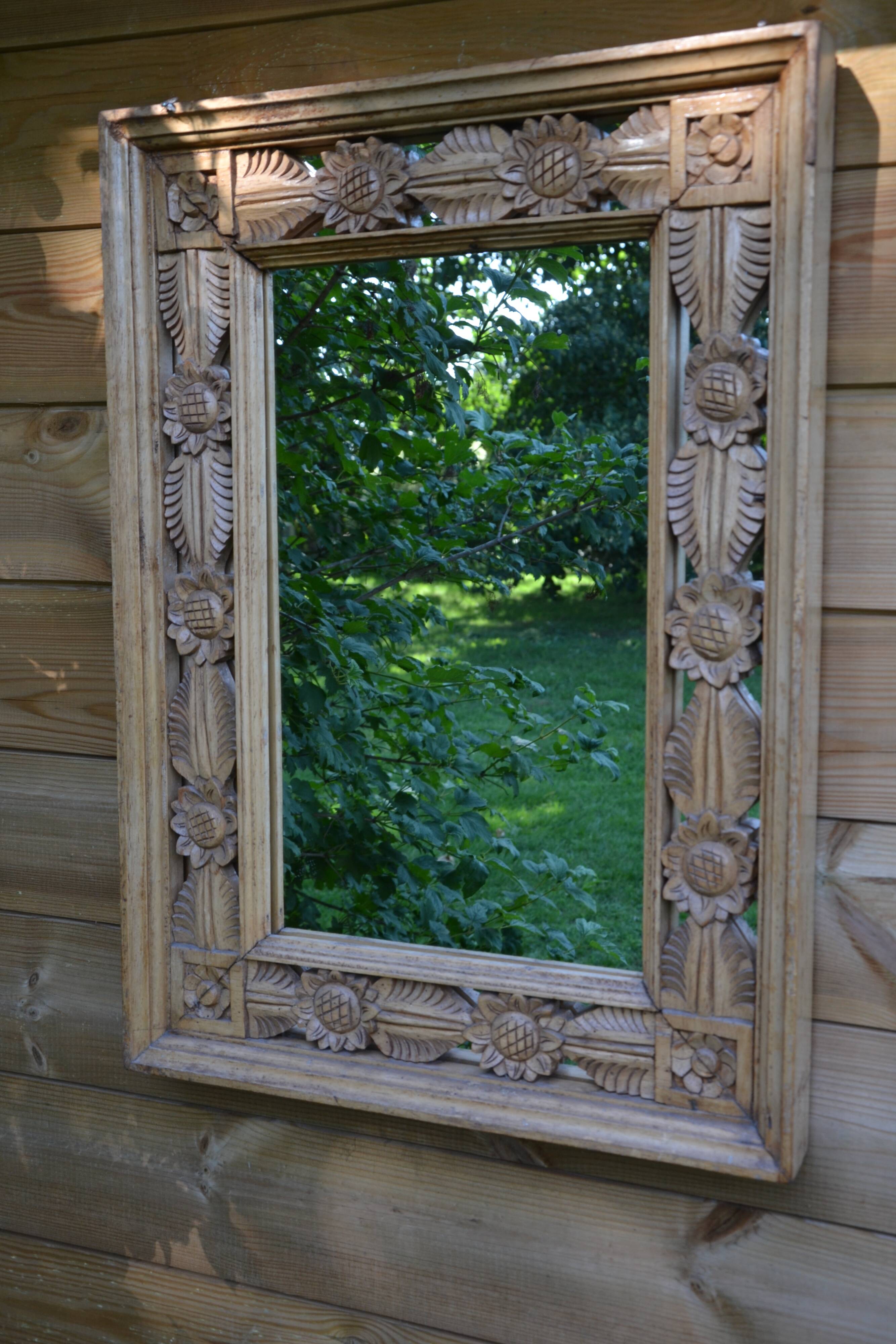 Large carved wooden mirror