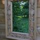 Large carved wooden mirror