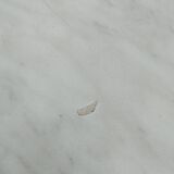 Antique bistro table with marble-decorated top