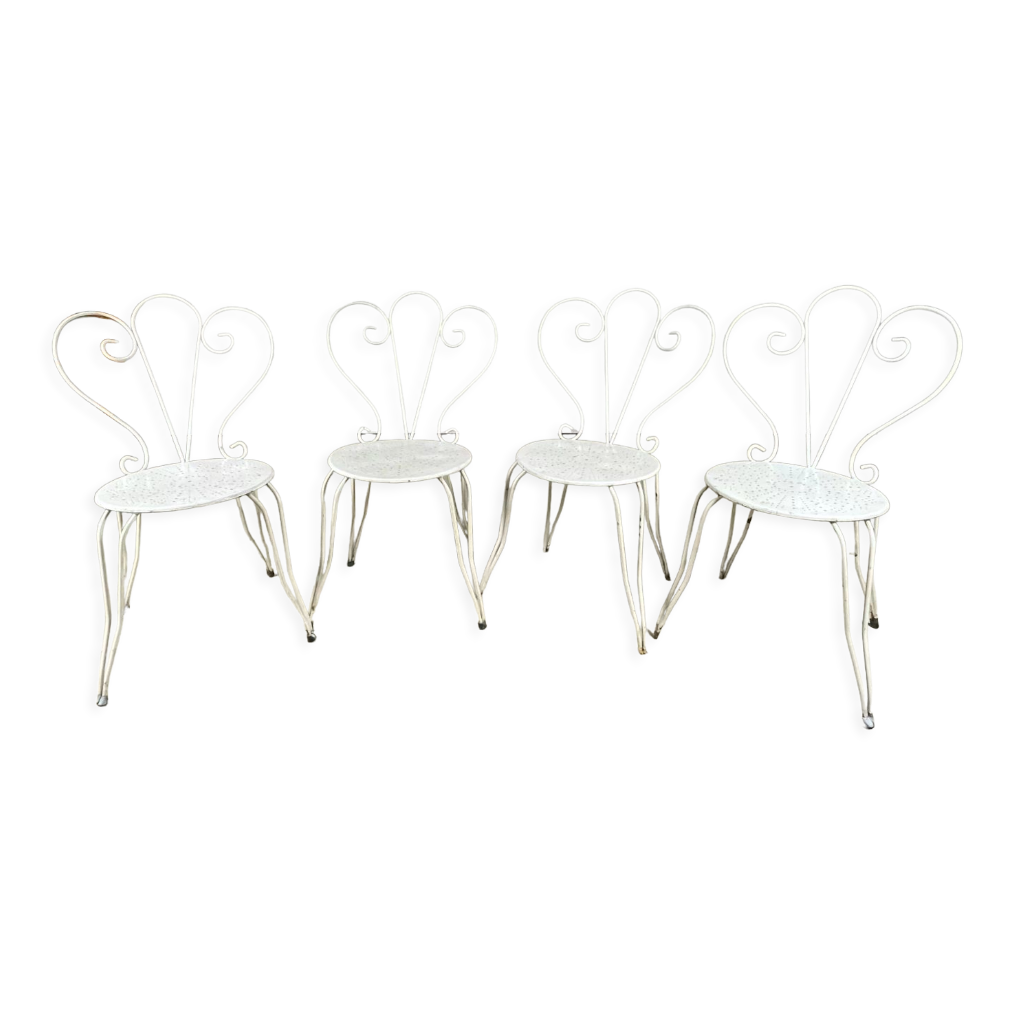 4 vintage wrought iron chairs