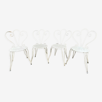 4 vintage wrought iron chairs