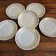 16 flat gold plates from Orchies porcelain