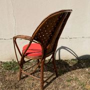 Vintage 1970s armchair in curved woven chestnut + seat cushion