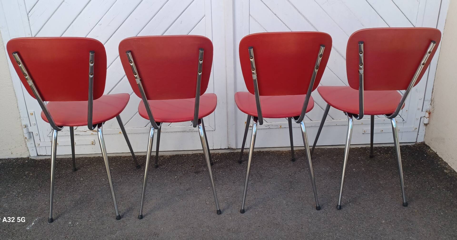 4 vintage Lafargue kitchen chairs in faux leather and chrome